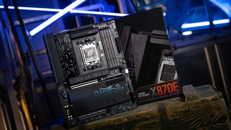A black Colorful iGame X870E Ultra-S V14 motherboard with graffiti-style lettering on its heatsinks, leaning against its retail box under blue neon lights