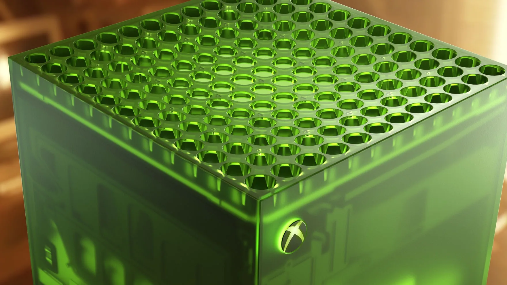 Close-up of a translucent green Xbox Series X console from above, its perforated top vent glowing green and the Xbox logo lit on the front