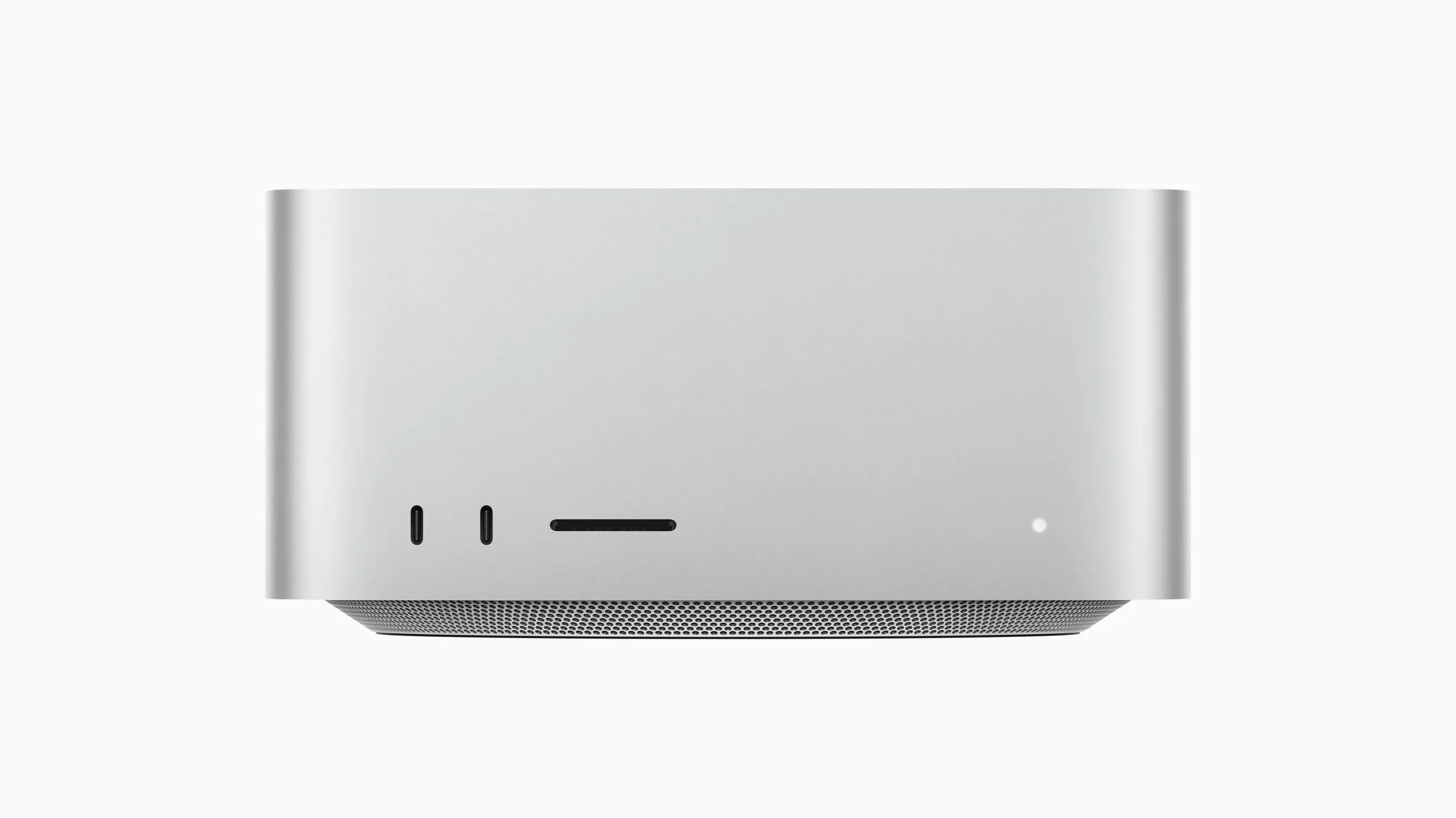 Front of the silver Mac Studio, with two ports, an SD card slot and a status light