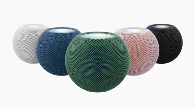 Five HomePod mini 2 speakers in white, blue, green, pink and midnight